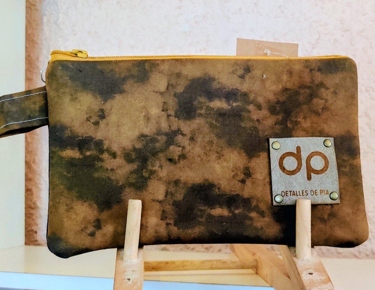 Estuche unisex mezclilla y algodón.