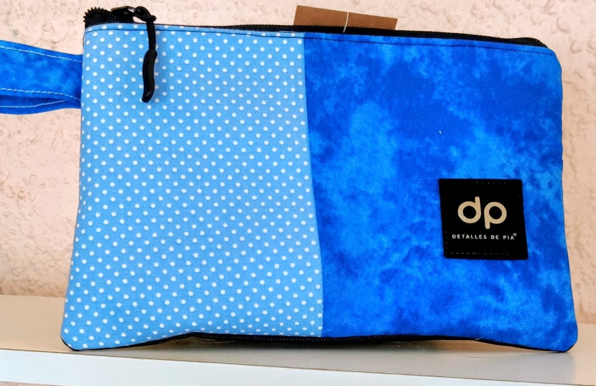 Estuche unisex mezclilla y algodón.